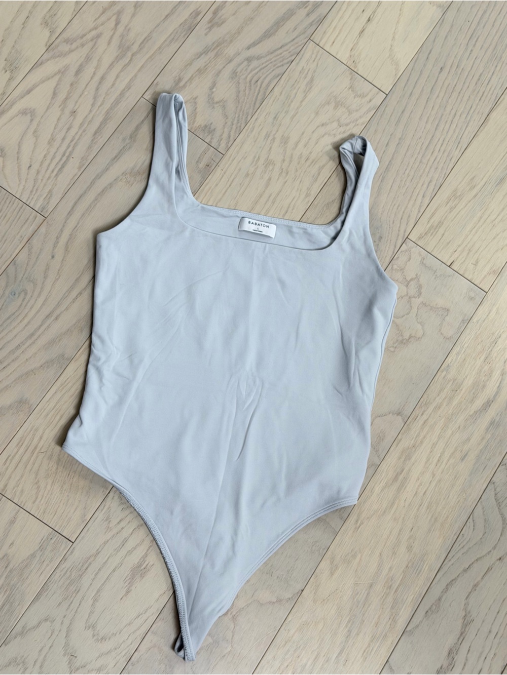 Babaton Pale Gray One-Shoulder Bodysuit